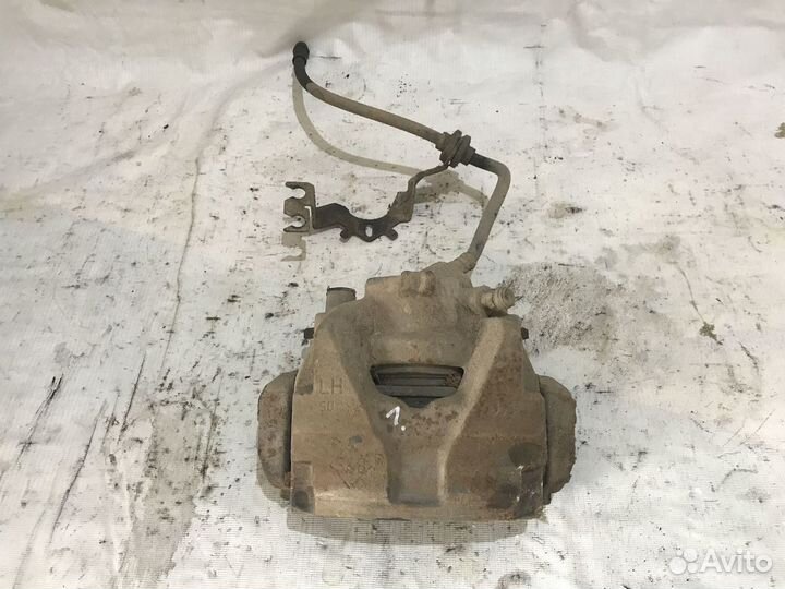 Суппорт тормозной передний левый Renault Megane