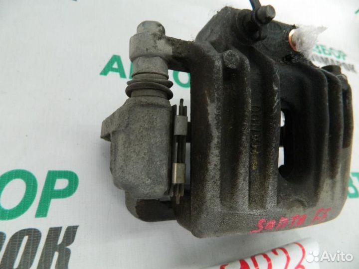 Суппорт задний левый для Hyundai Santa Fe 2 2006