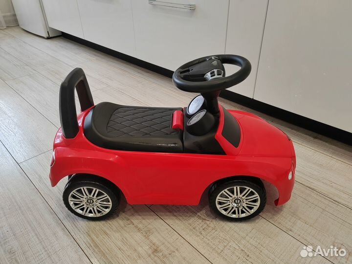 Детская машинка каталка bmw