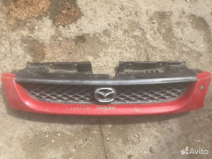 Решетка радиатора Mazda Capella GW 1999г