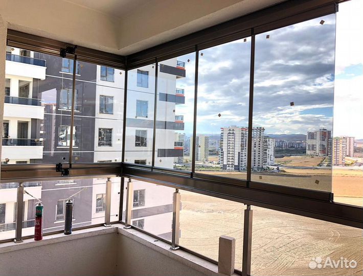 Безрамное раздвижное остекление