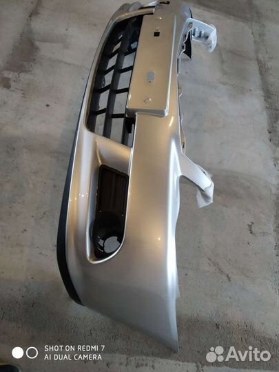 Бампер Ниссан Альмера G15. новый,серебристый