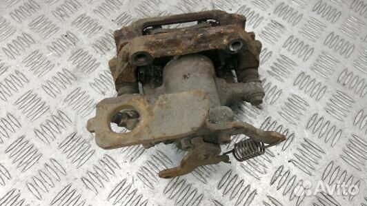 Суппорт тормозной задний левый toyota avensis T27