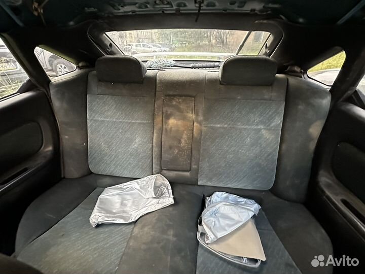Mazda 323, 1998