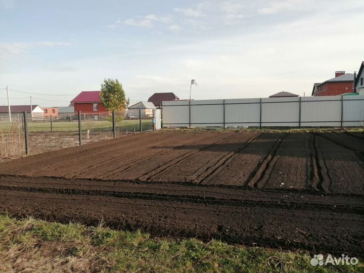 Вспашка земли минитрактором