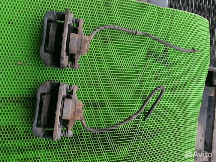 Суппорт передний на Geely Emgrand EC7 11-16