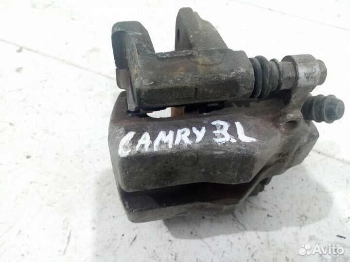 Суппорт задний левый Toyota Camry V40