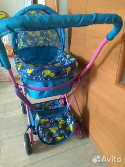 Игрушечная коляска для кукол