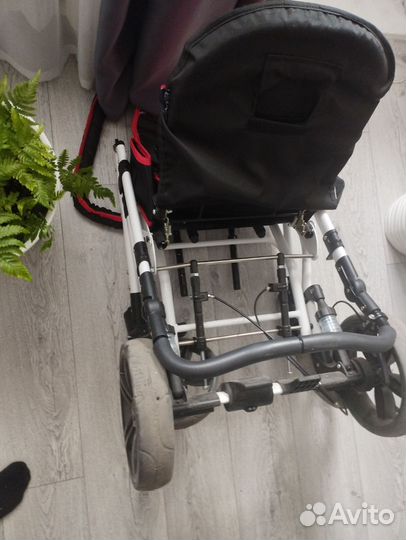 Коляска для детей с дцп