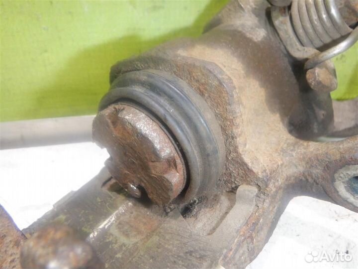 Суппорт задний левый Хендай Лантра 96-00