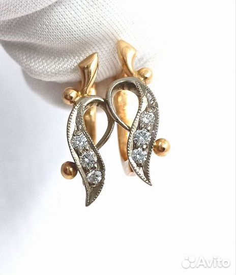 Золотые серьги с камнем