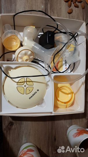 Молокоотсос medela электрический