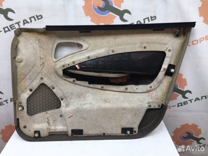 Обшивка двери передняя левая Daewoo Nubira
