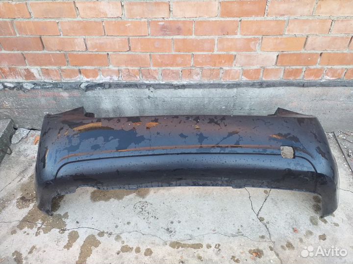 Бампер задний Chevrolet Cruze седан до рестайлинг