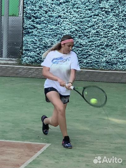 Тренер по большому теннису