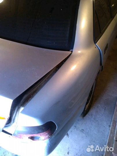 Крышка багажника Mitsubishi carisma каризма