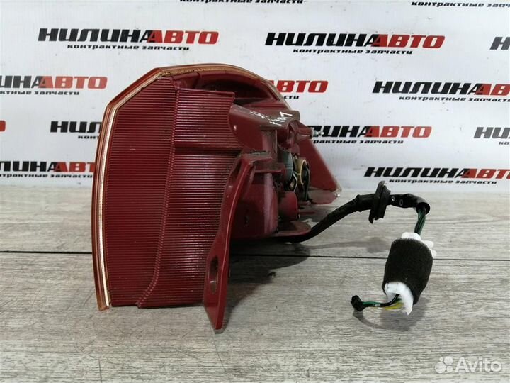 Фонарь левый Митсубиси Лансер 10