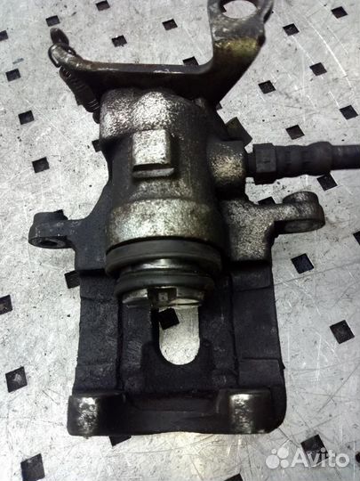 Суппорт задний левый Ford Focus/Focus RS