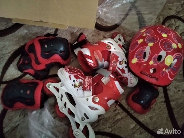 Роликовые коньки