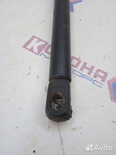 Амортизатор крышки багажника левый