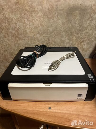 Принтер Ricoh Aficio SP 100