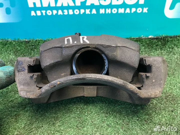 Суппорт передний правый Chevrolet Aveo T250 1.4