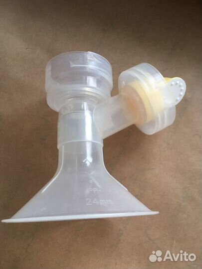 Молокоотсос medela