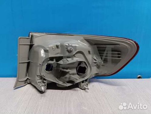 Фонарь левый внешний Toyota Corolla 10 E150