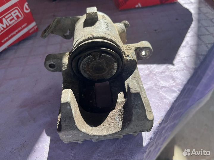 Суппорт задний skoda octavia тур 1.8