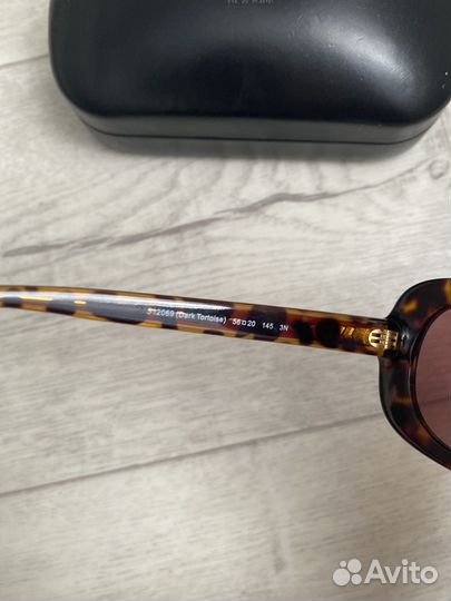 Солнцезащитные очки Coach