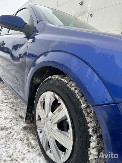 Передние крылья на Opel Astra H