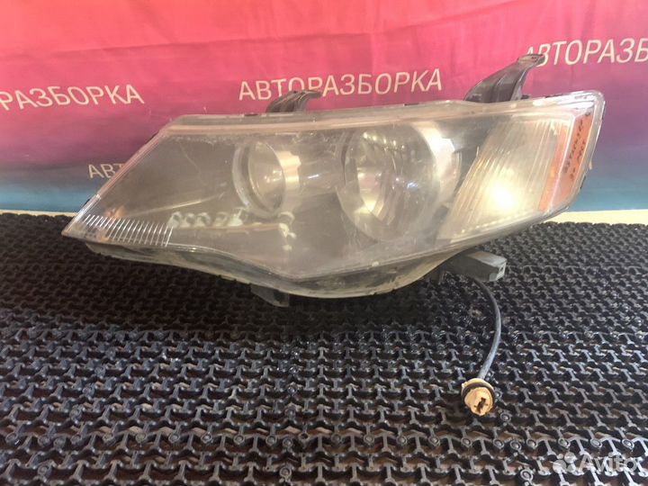 Фара левая xl Mitsubishi Outlander