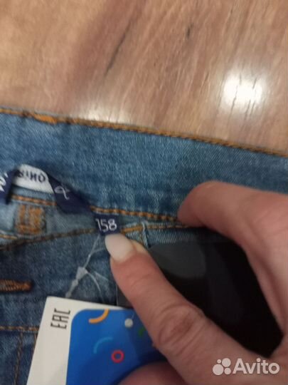 Джинсы новые