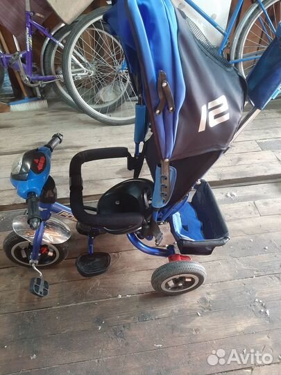 Детский велосипед с ручкой