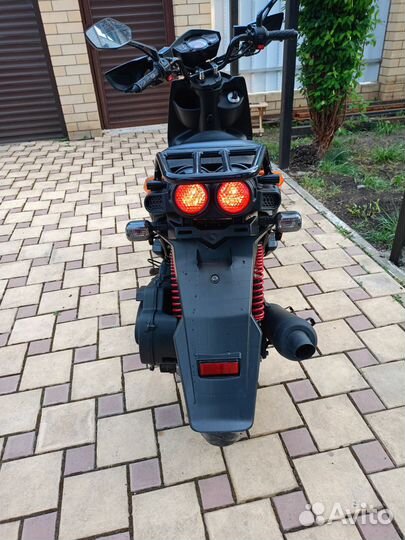 Новый максискутер