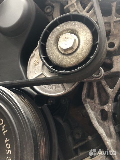 Натяжитель ремня VAG VW 04L903315B