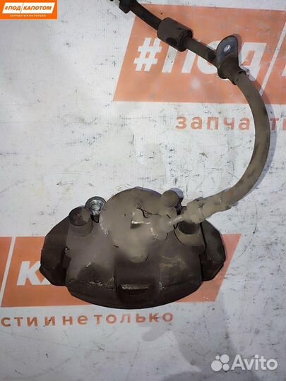 Суппорт тормозной передний левый Ford Focus 3 2011