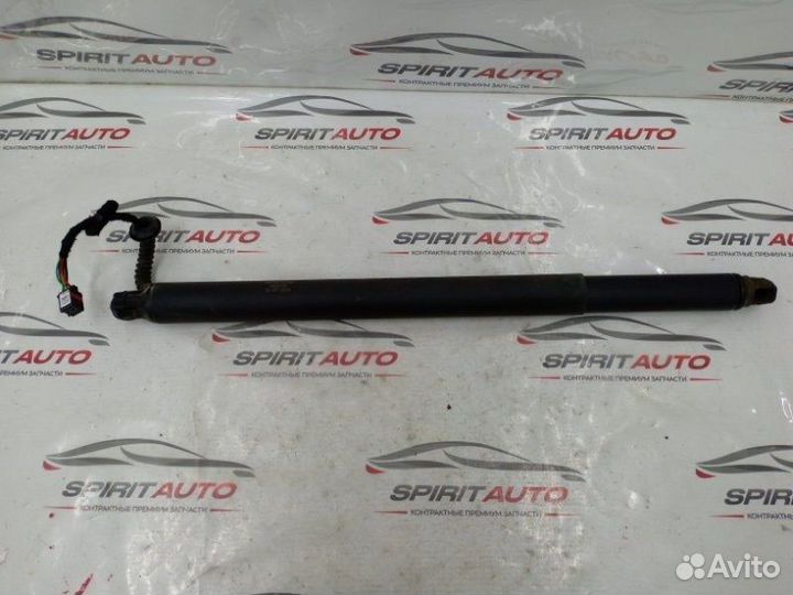 Амортизатор двери багажника задний левый Kia