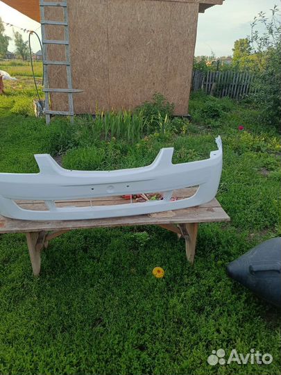 Передний бампер mazda 323