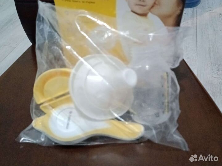 Молокоотсос ручной Medela Harmony новый