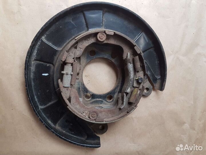 Щит опорный Mitsubishi Lancer 10