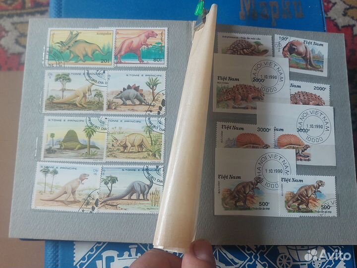 Альбом с почтовыми марками динозавры.Африка.Азия