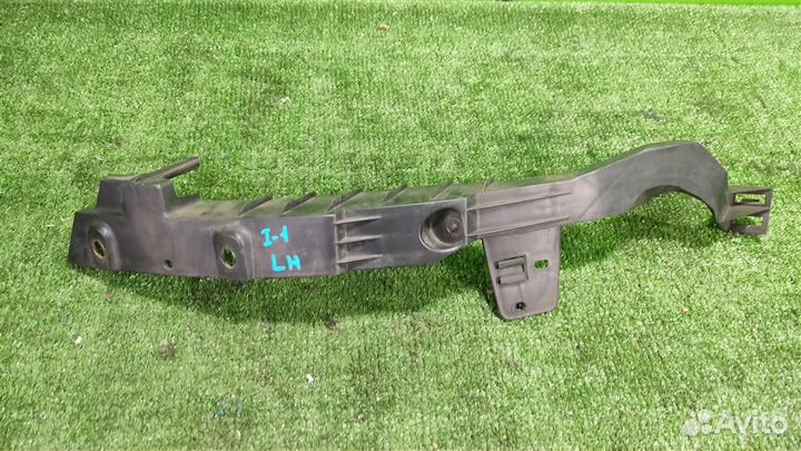 Кронштейн бампера переднего левый Opel Astra J 20