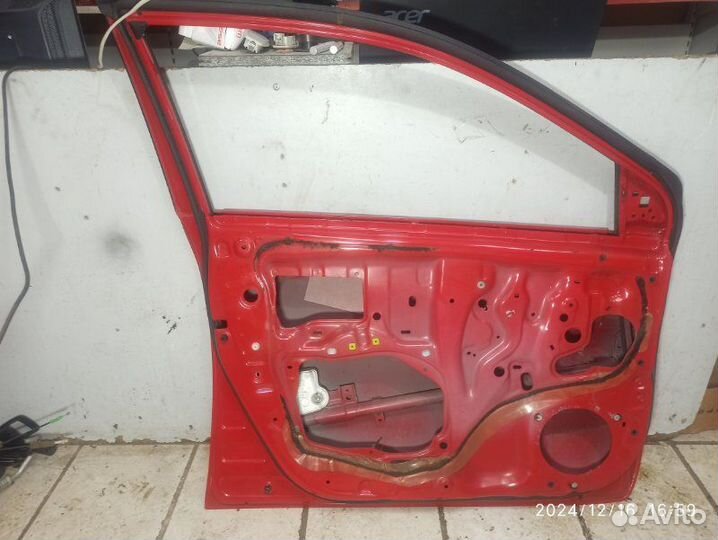 Дверь передняя левая Toyota Corolla 150