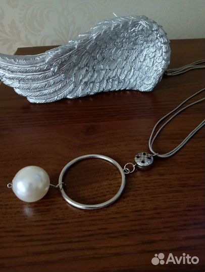 Украшение на шею длинное