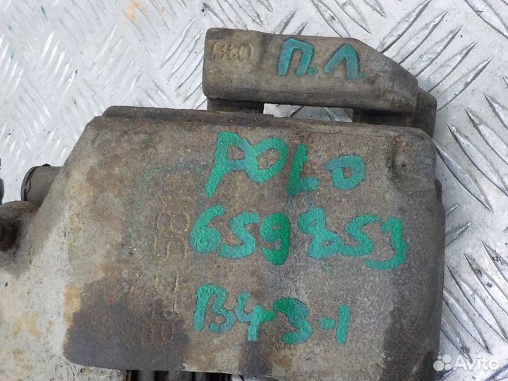 Суппорт тормозной передний левый на Volkswagen Pol