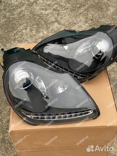 Фары Porsche Cayenne 955 02-06 ксенон с дхо черные