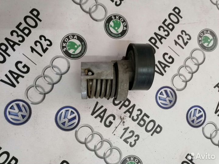 Натяжитель ремня генератора Фольксваген Гольф 5