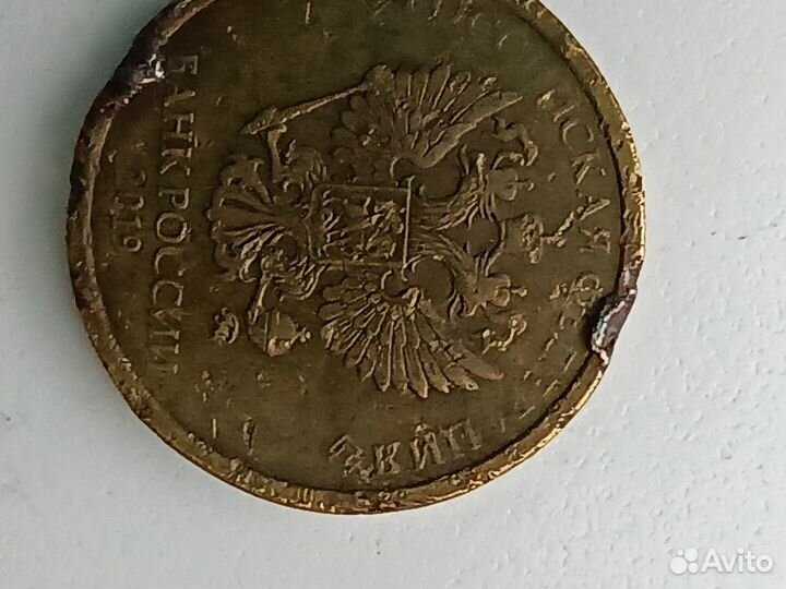 Десятки монеты с интересным браком