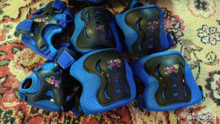 Роликовые коньки